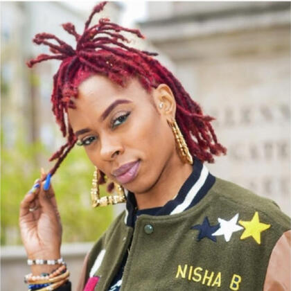 Nisha B