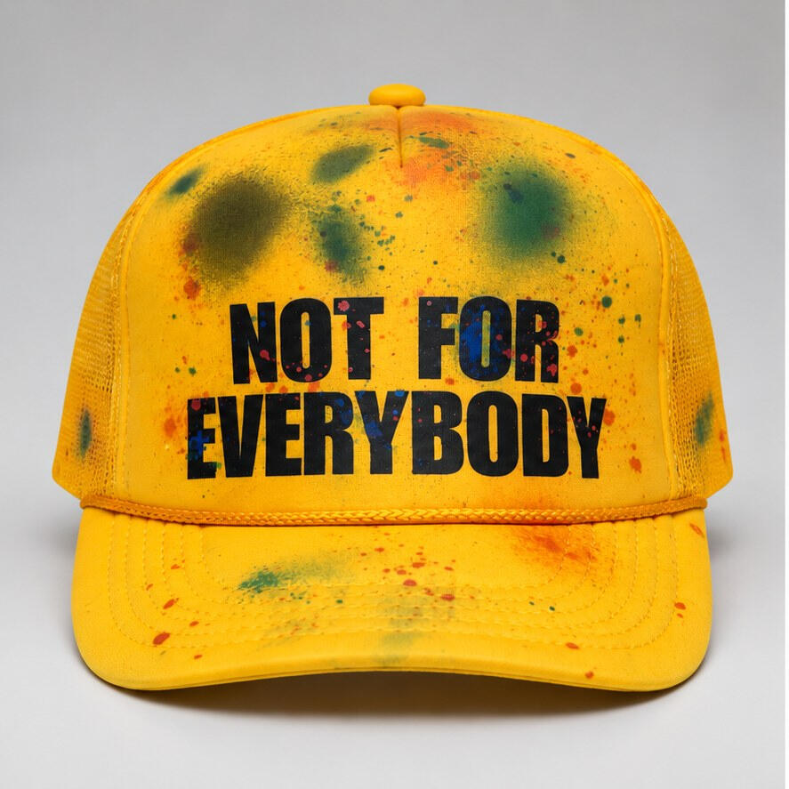 Yellow paint-splatter trucker hat with black Not For Everybody print
